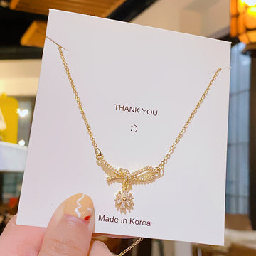 Necklace Daisy Bow (Stainless Steel + Copper)